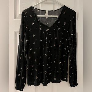 ***😀3 for $35./Beautiful “Guilty” black pattern long sleeve blouse.